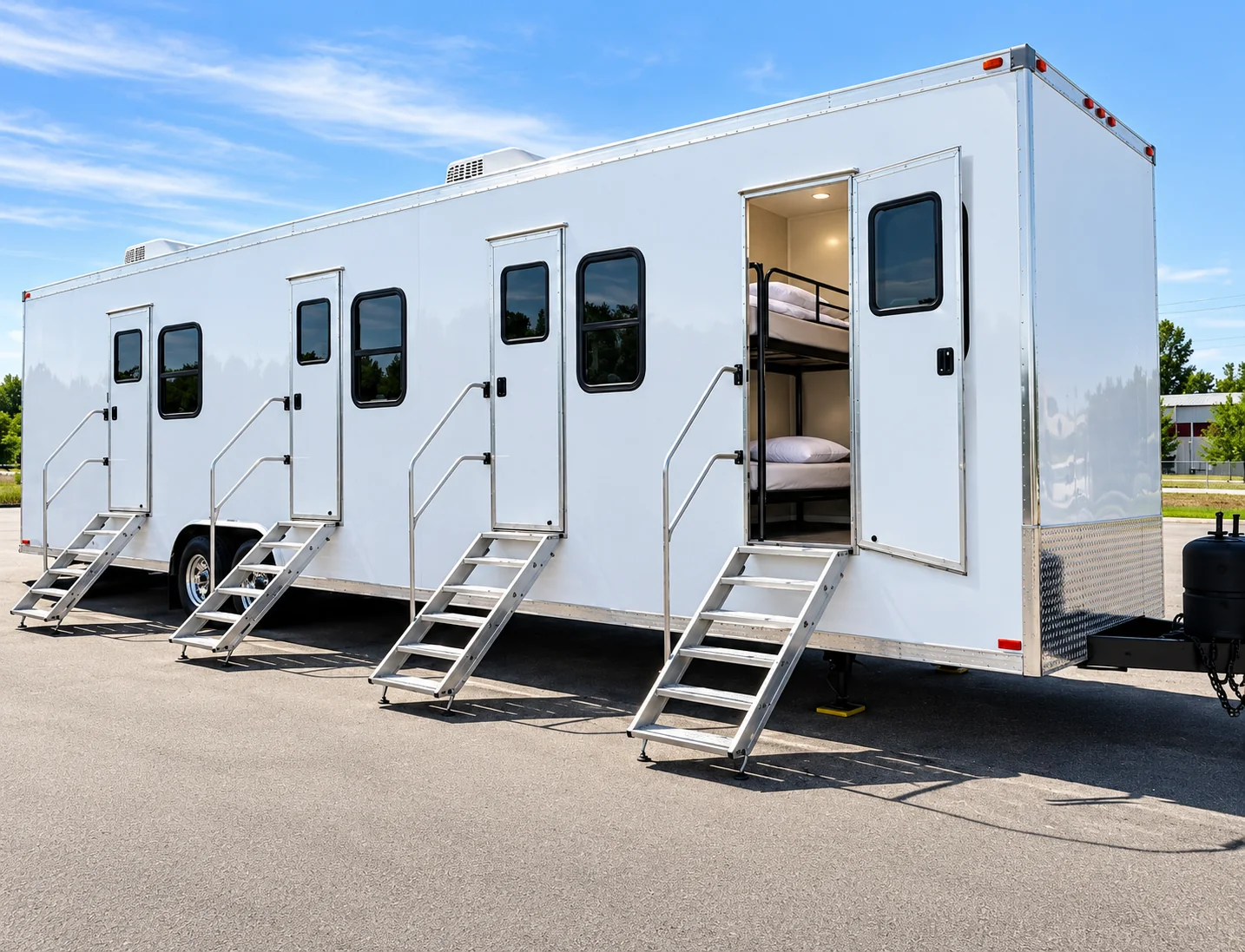 Accommodation trailer with separate entry doors and steps