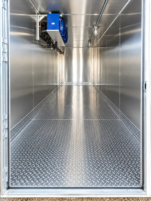 Cold-storage interior with ceiling-mounted cooling equipment