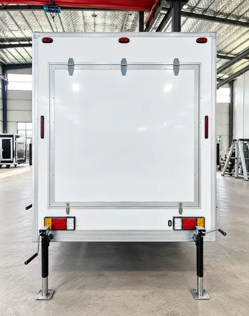 Shower trailer with closed end access panel