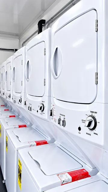 Laundry equipment and interior working aisle