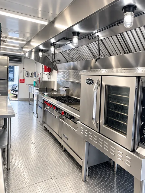 Cooking line beneath an exhaust hood