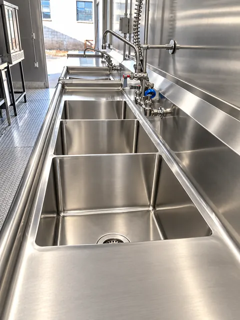Three-compartment commercial sink