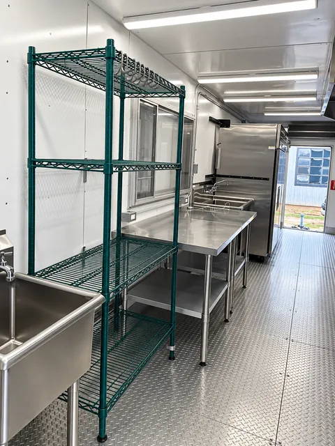 Storage racks beside the prep and wash area