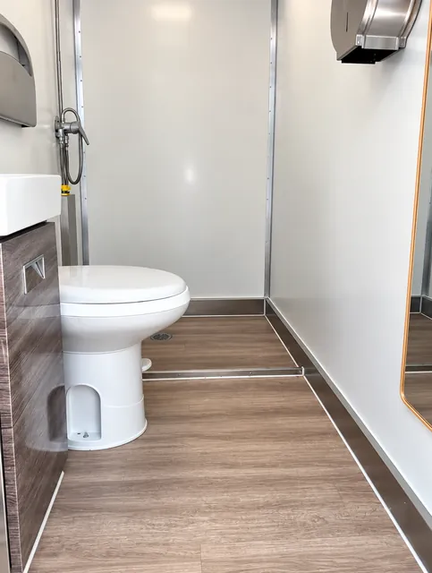 Private bathroom with shower and toilet