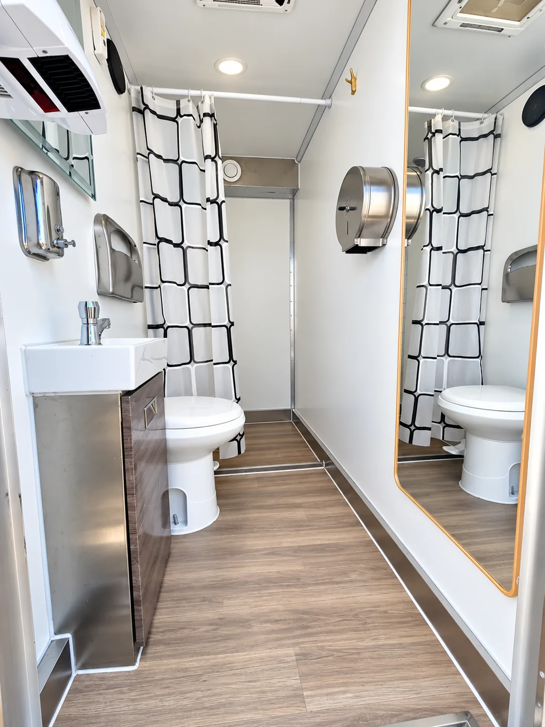 Shower, toilet, and vanity inside a private bathroom