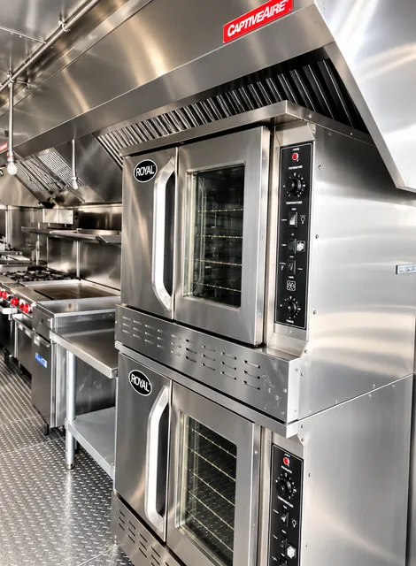 Stacked commercial convection ovens
