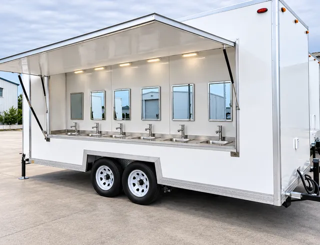 Handwashing trailer with multiple exterior wash stations
