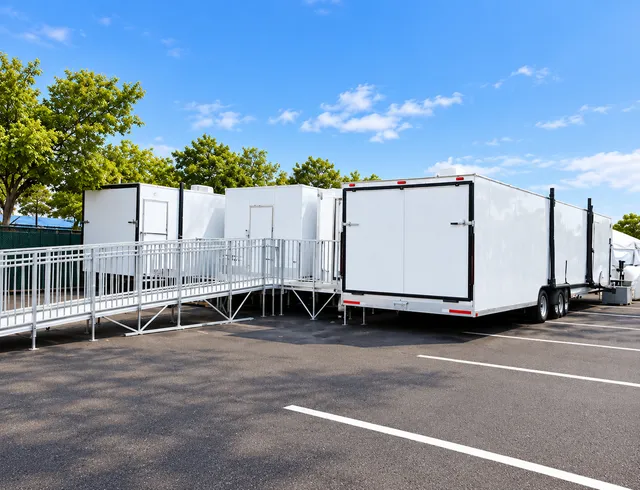 Metal ramp system connecting temporary trailer entrances