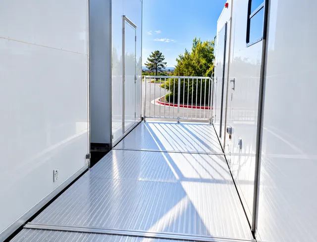 Ramp walkway between temporary trailers