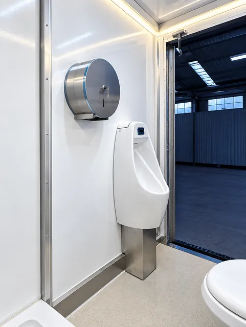 Restroom urinal and handwashing area
