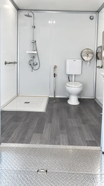 Bathroom shower and toilet compartment